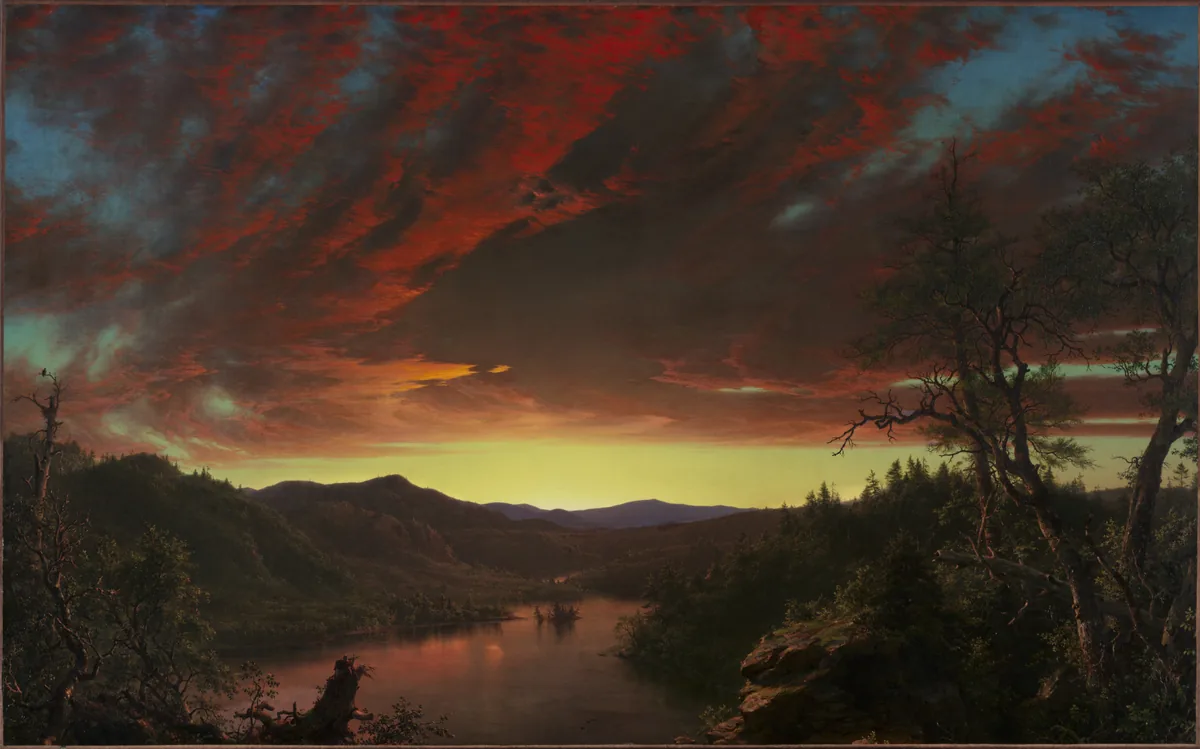 A blood-red and gold sunset blazes above a dark wilderness lake and forest; a lone bird sits on a broken tree in the foreground.