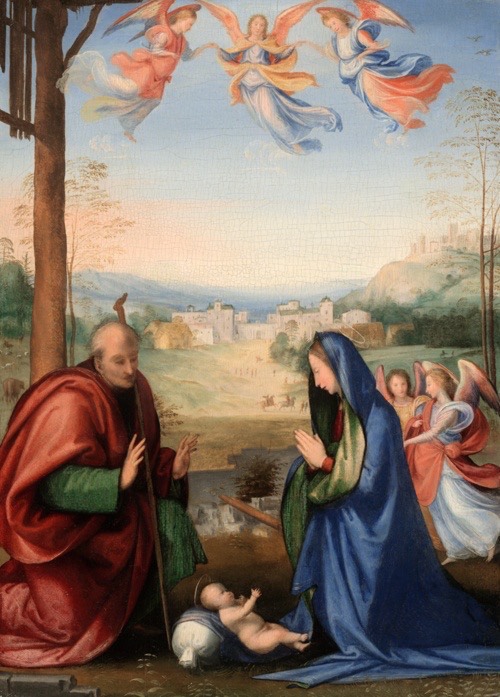 A light-skinned man in red and woman in blue sit with an infant between them, angels beside and above them, a small town in the background.