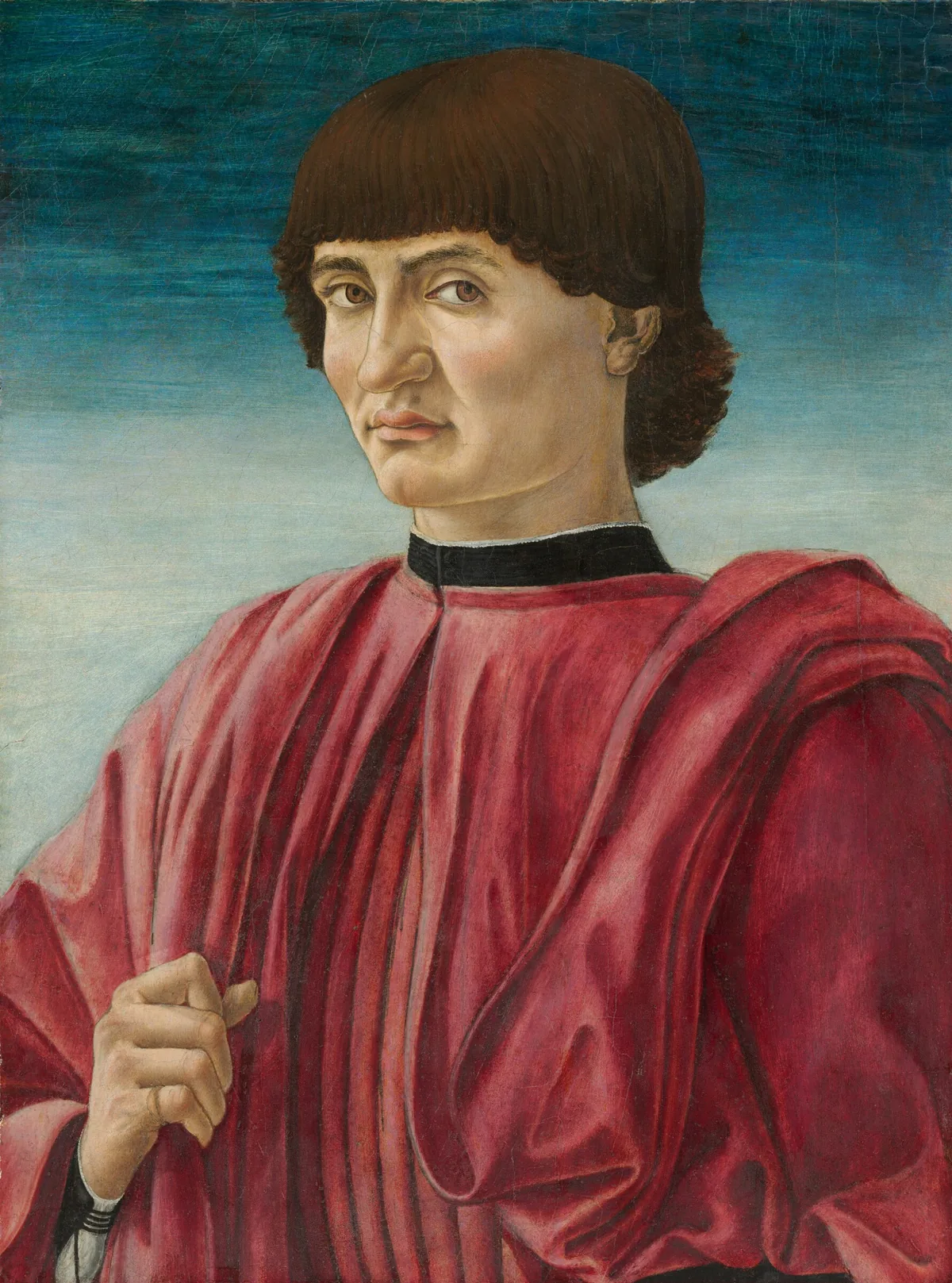 The head, shoulders, and chest of a man wearing a deep rose-red garment fills this vertical portrait painting.