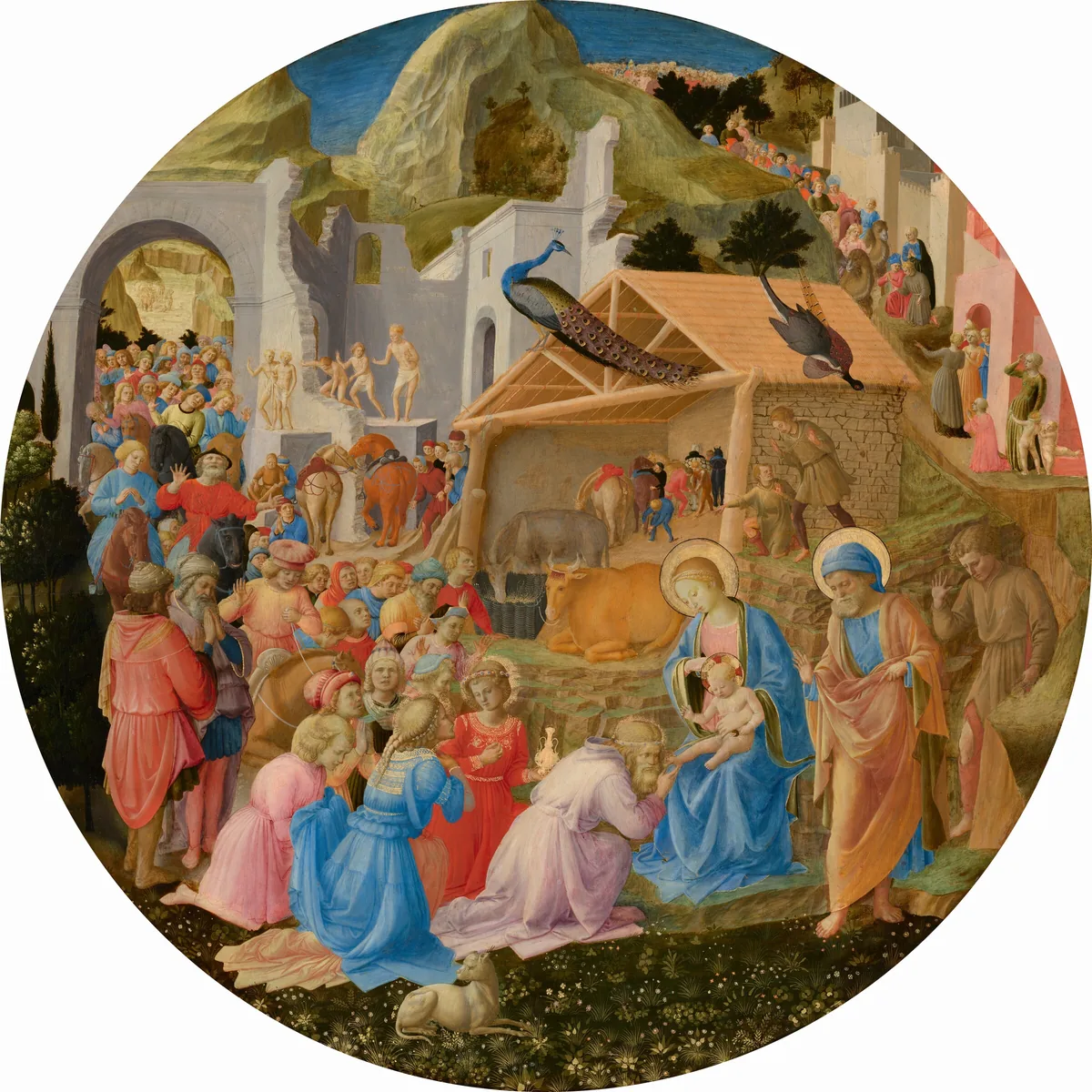 Dozens of people line up around a shed-like structure and around stone ruins to kneel before a woman and baby at the lower center of this circular painting.