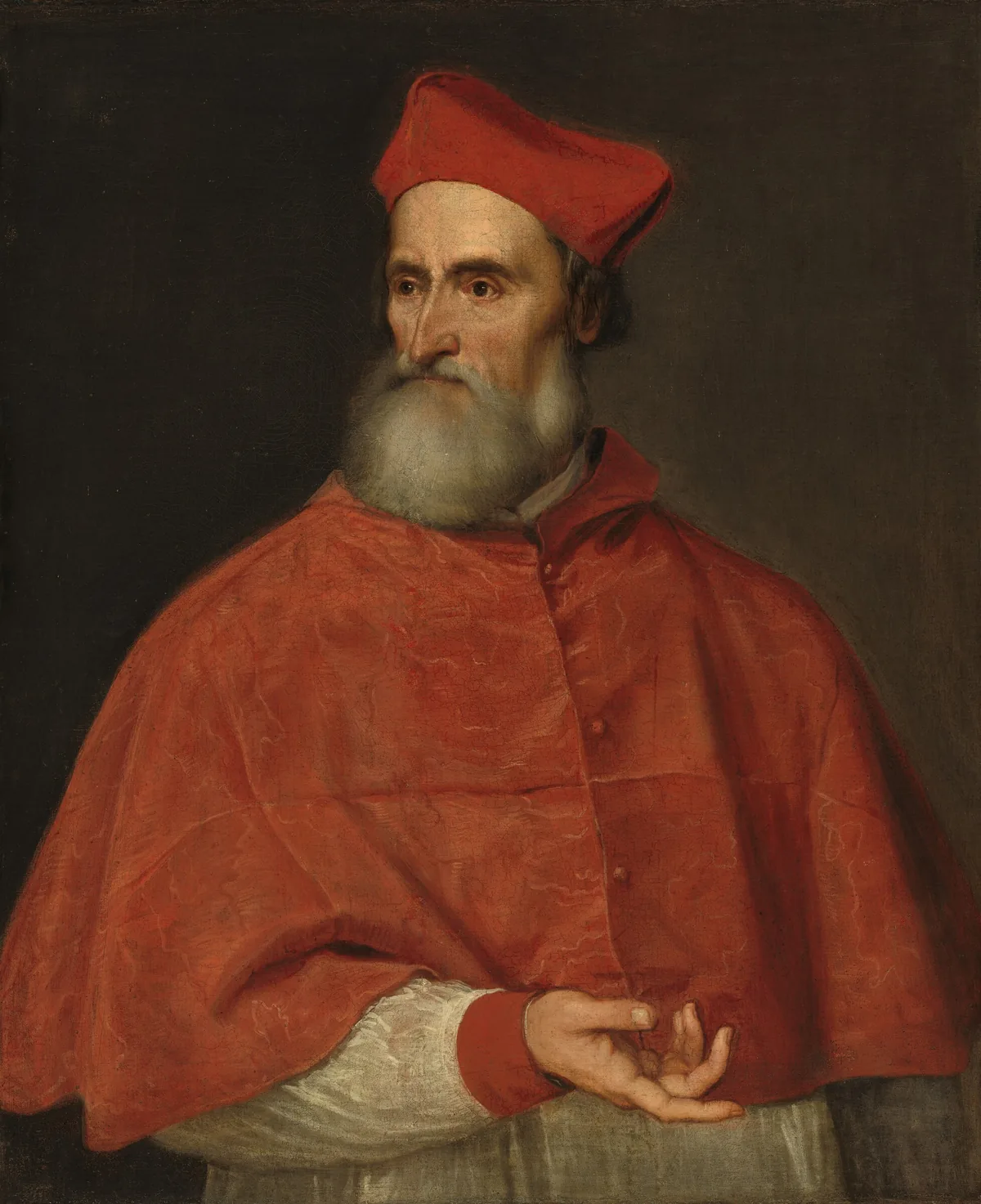 Shown from the waist up, an older, pale-skinned man wearing clerical robes gestures to our right with one hand and turns his head to look off to our left in this vertical portrait painting.