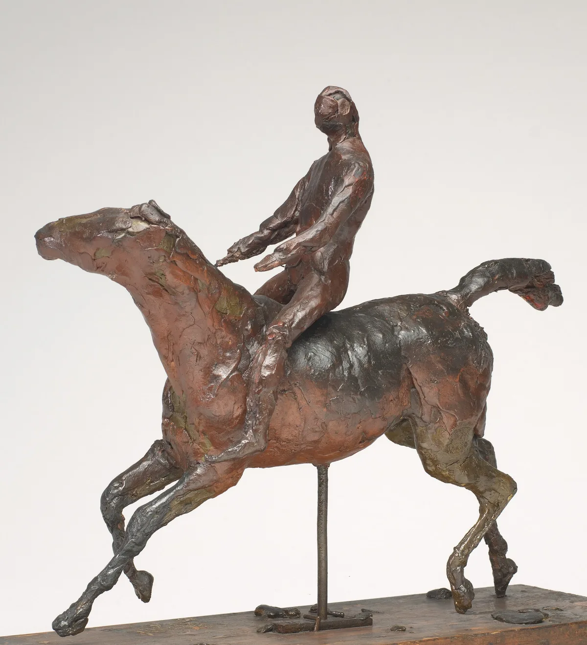 The sculpture depicts a figure riding a horse.