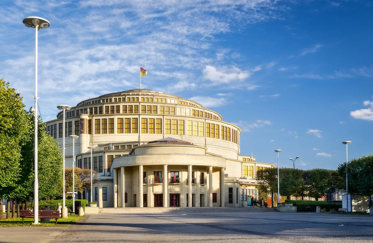 The ribbed reinforced-concrete dome of Centennial Hall seen from the floor below.